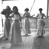 Photograph of young passengers skipping on deck of a cruise ship, 1910 (Crown Copyright, National Records of Scotland,GD1/585/24)