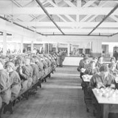 Photograph of staff in munitions works canteen, HM Factory Gretna, 1918 (Crown Copyright, National Records of Scotland,GD1/1011/8)