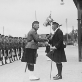 Photograph of George V, in kilt, visits Ballater station, 1935 (Crown Copyright, National Records of Scotland, BR/LNE/4/477/2)