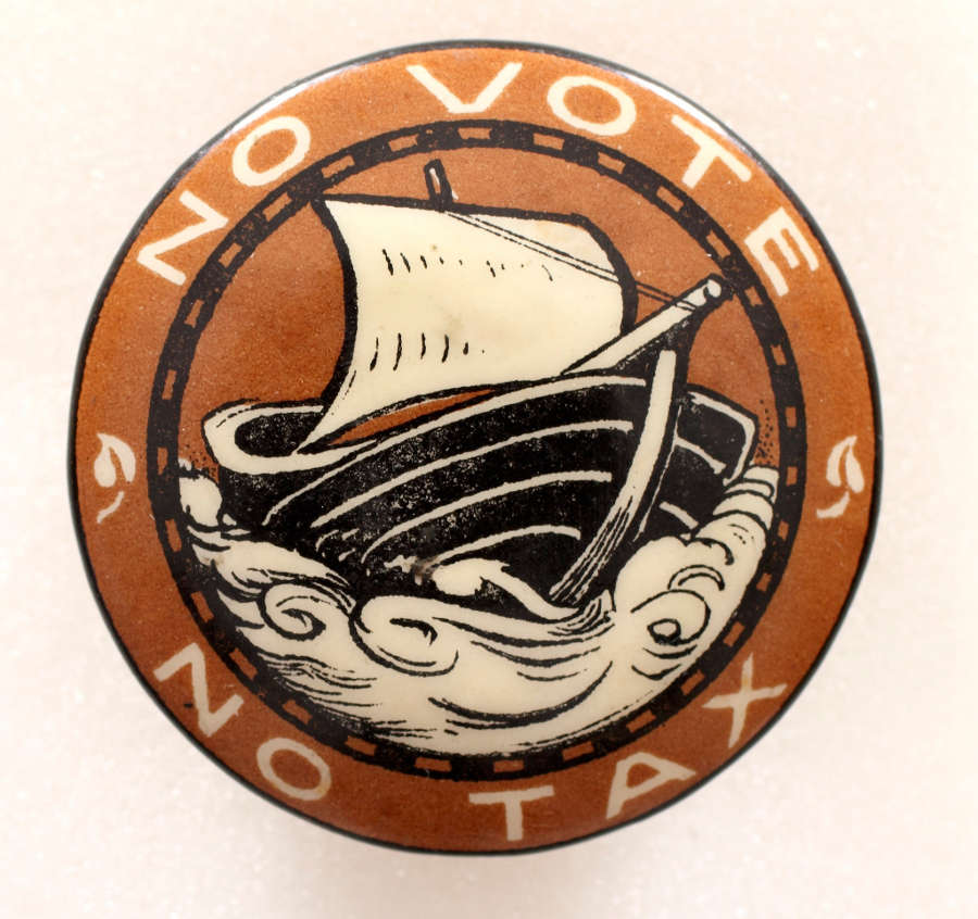 Image of a Women’s Tax Resistance League badge. Features an image of a ship and the words ‘No Vote No Tax’.