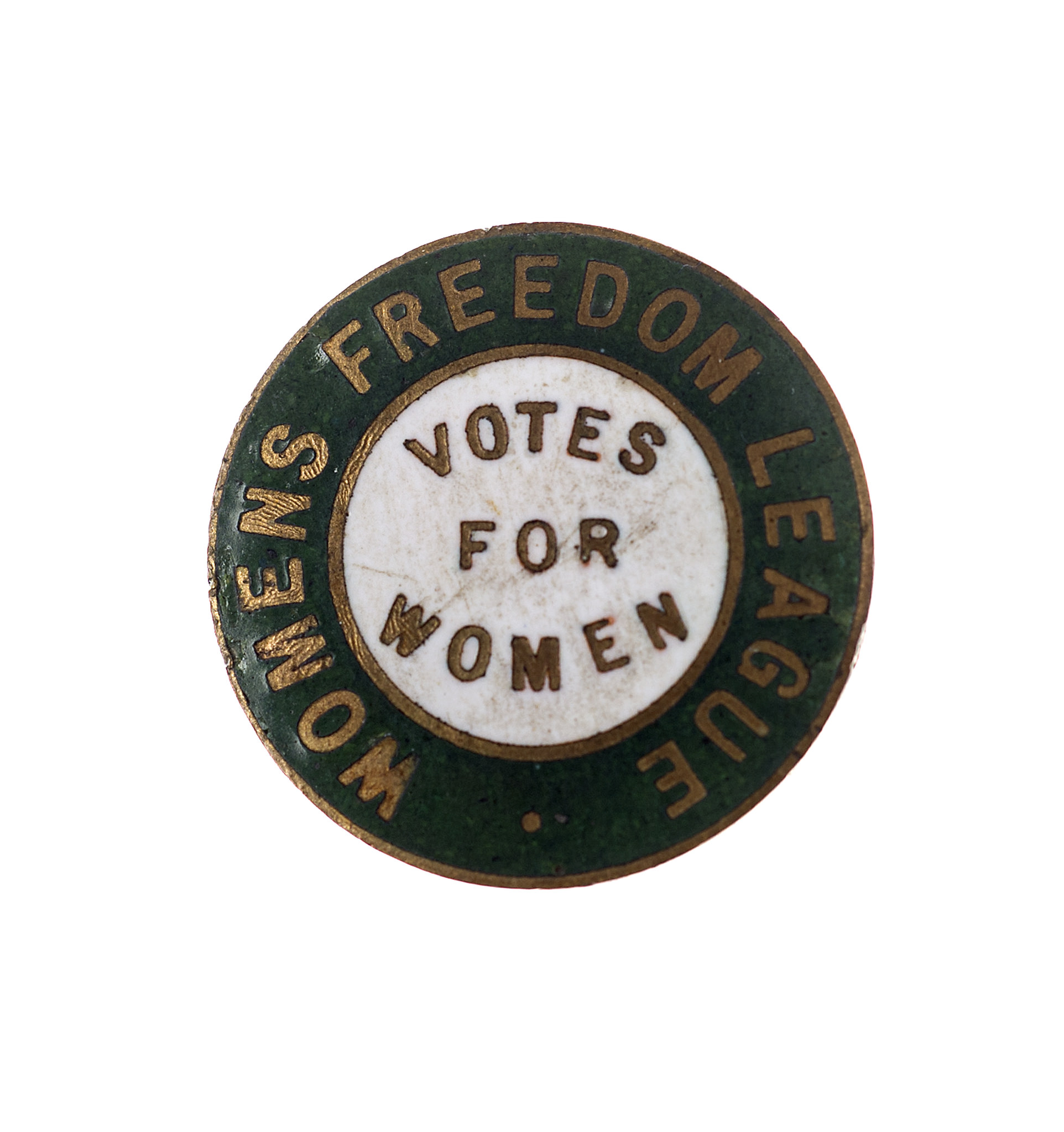Image of a Women’s Freedom league badge. Around the edge are the words ‘Womens Freedom League’ and in the centre, the words ‘Votes for Women’.